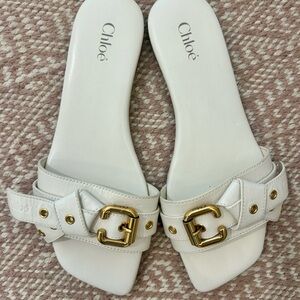 Chloe Mae White and Gold Sandals with Buckle Accents